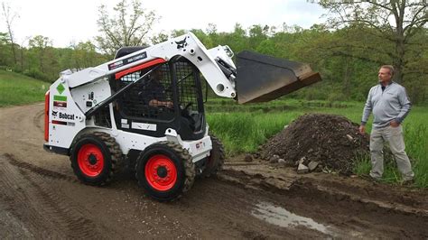 how do you drive a skid steer|operating a bobcat skid steer.